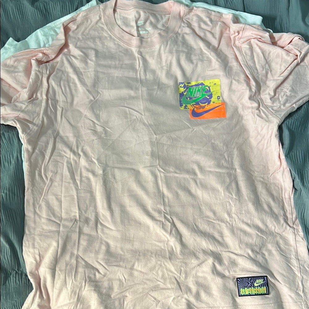 Nike Light Pink Tee with Vibrant Graphic